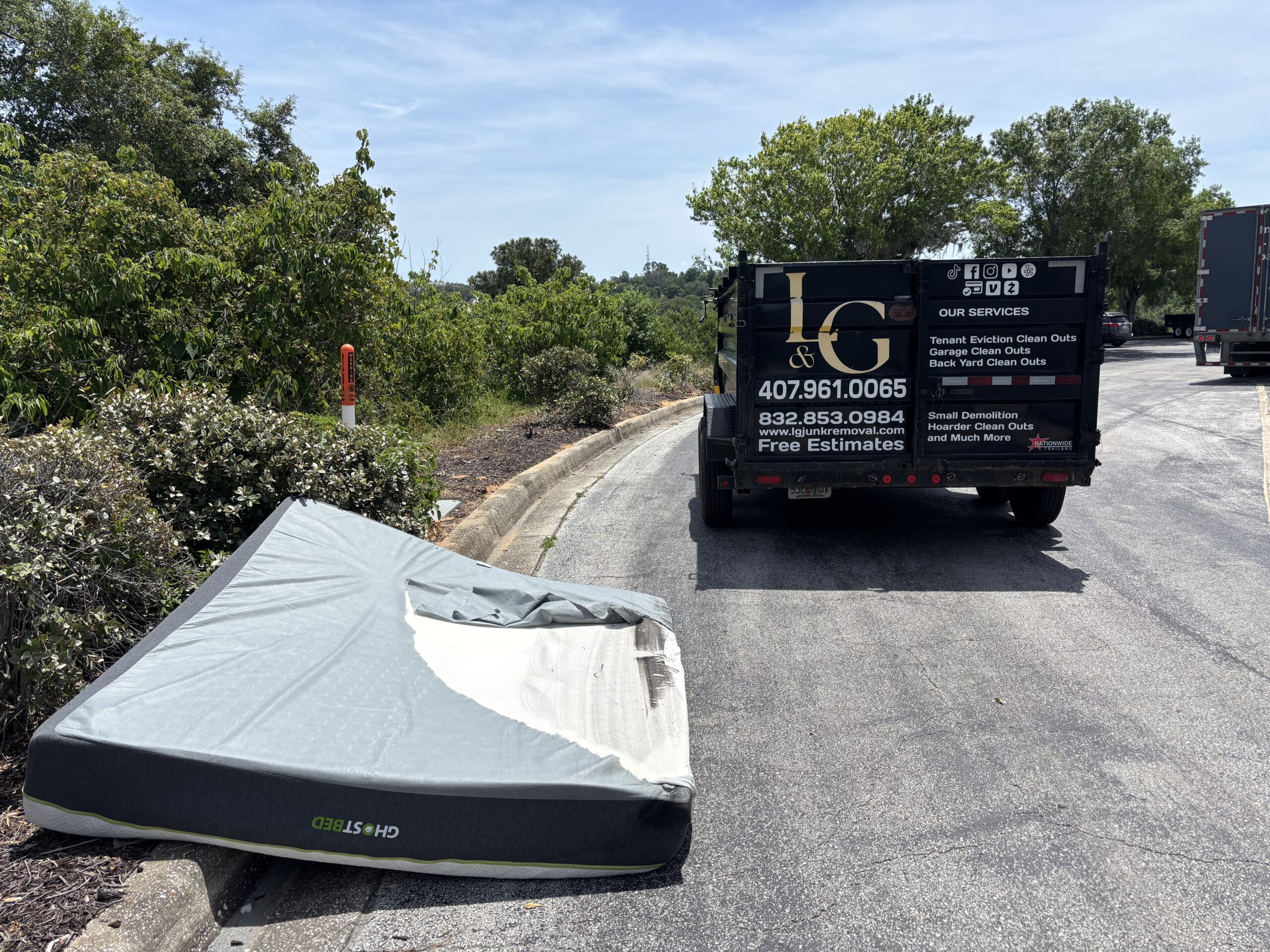 L&G Junk Removal removing old mattresses from a home in Orlando, FL.