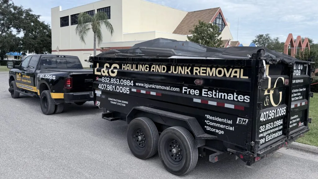 L&G Junk Removal truck and dumpster providing junk removal services in Orlando, Florida.